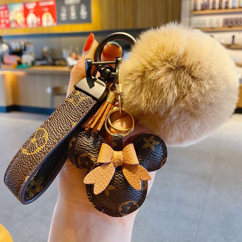 Portachiavi Mickey di lusso – Charm in ecopelle e pon-pon di pelliccia