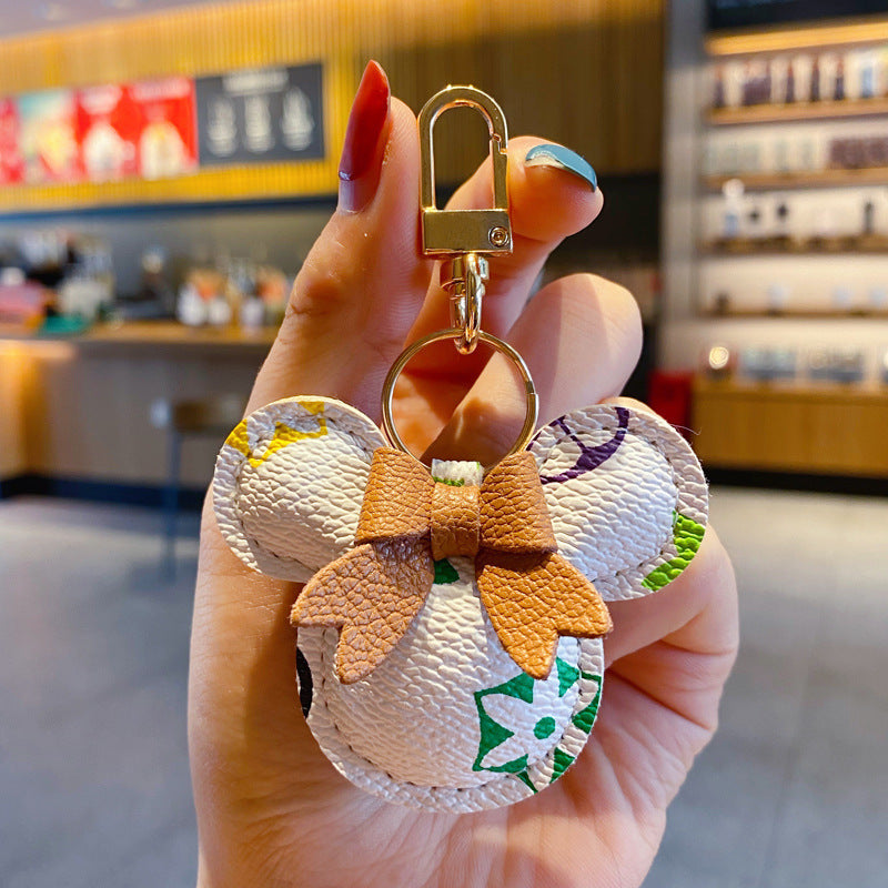 Portachiavi Mickey di lusso – Charm in ecopelle e pon-pon di pelliccia